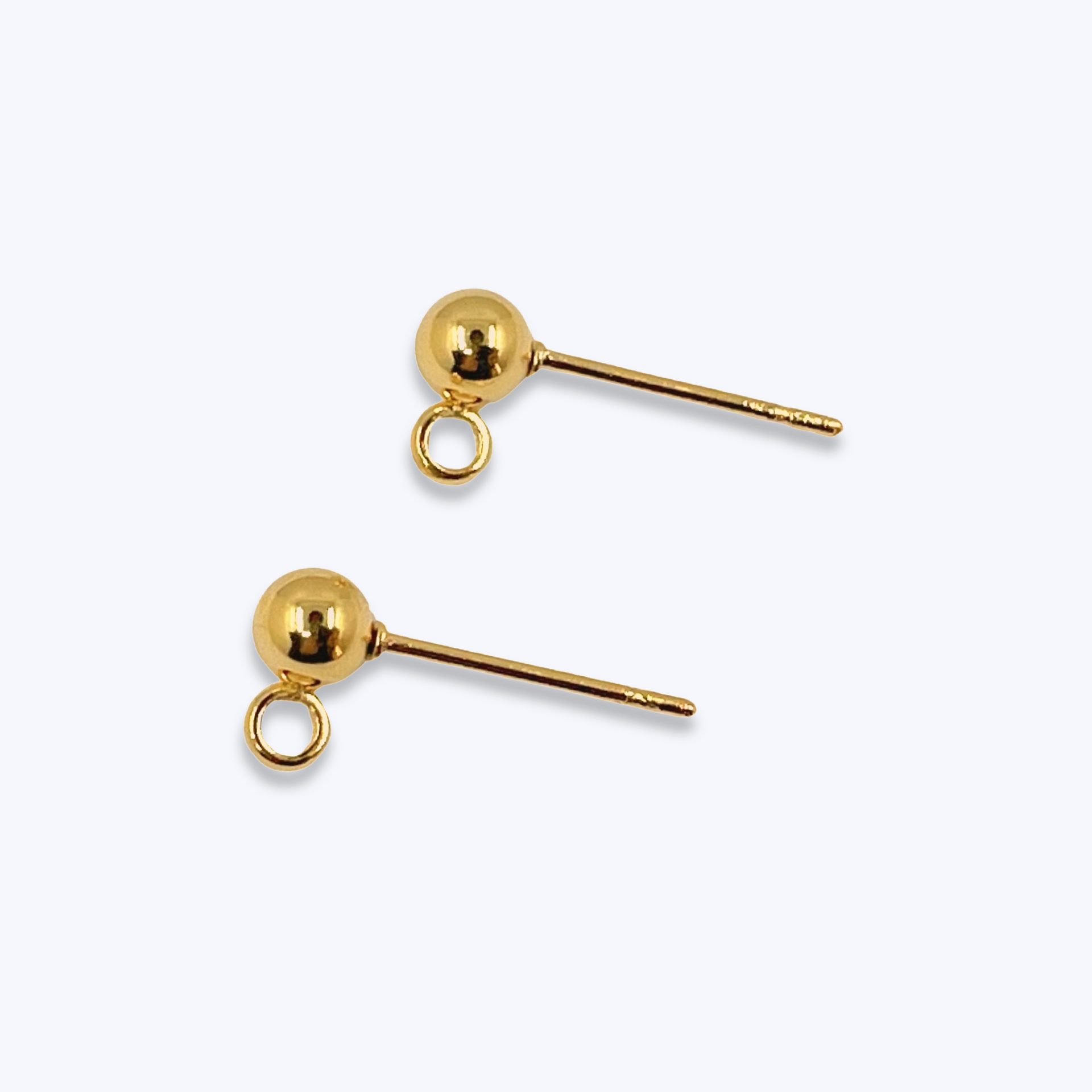 Korvakorutapit pallolla kullatusta kirurginteräksestä