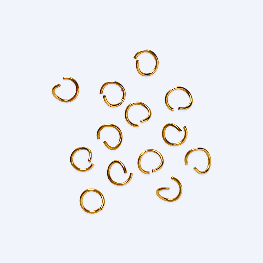 Nickelfria smyckestillbehör av kirurgiskt stål. Bindringar guld