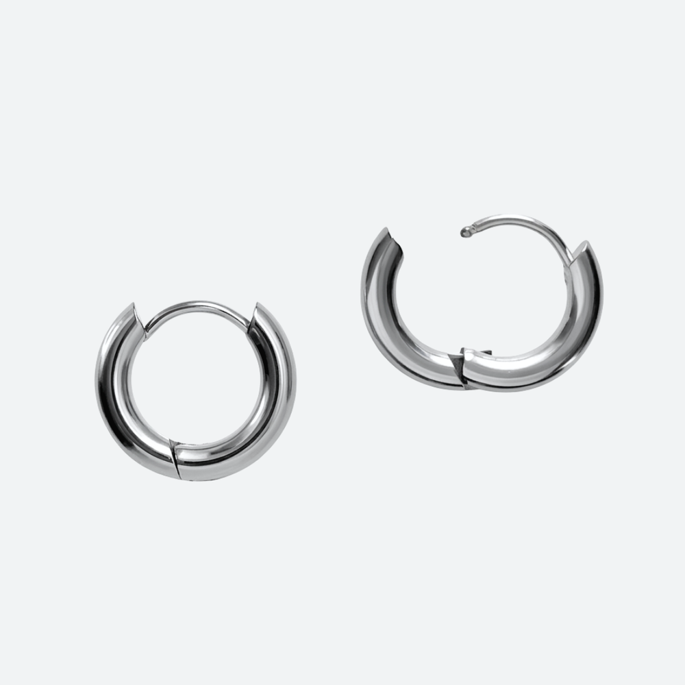 16 mm huggie-rengas paksulla 3 mm langalla lähikuvana, saranalukko kirurginteräksestä