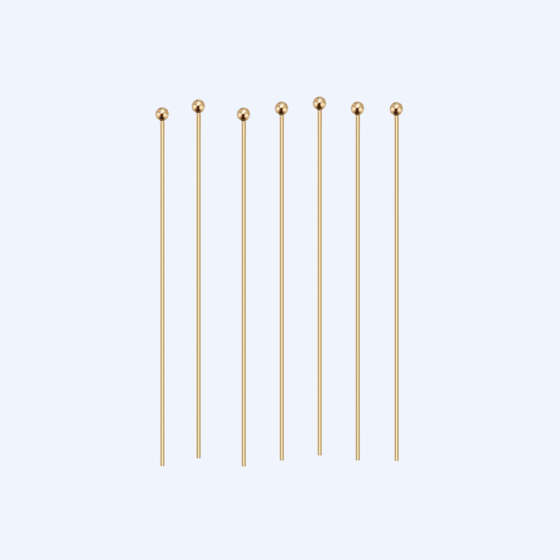 Viisi 18K kullattua korupiikkiä pallopäällä rinnakkain, 40 x 0,7 mm, kirurginteräs