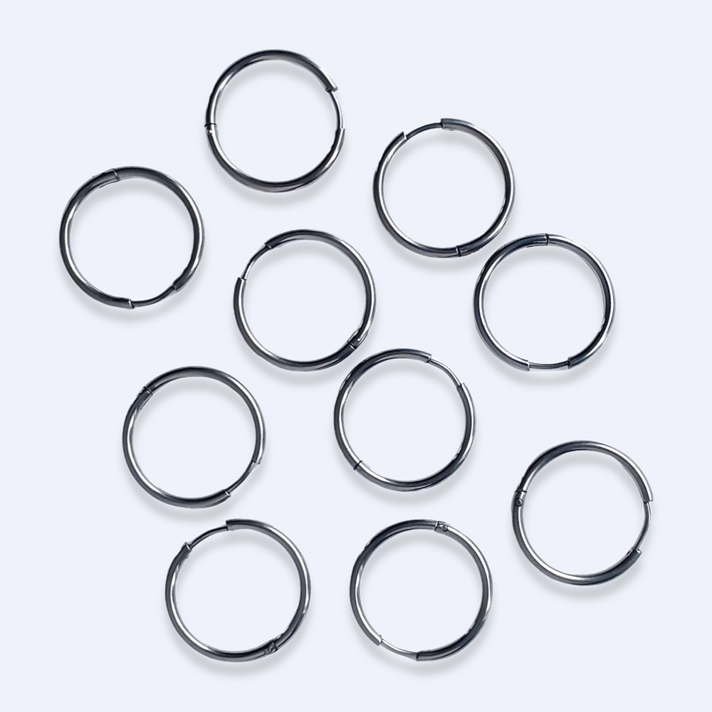 Nio huggie-ringar utspridda i en cirkel, 22 mm diameter, kirurgiskt stål